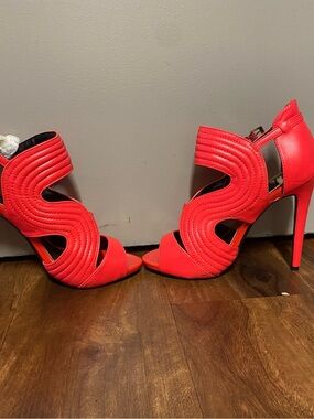 Sculptural Cutout Stiletto Sandals in Bright Red